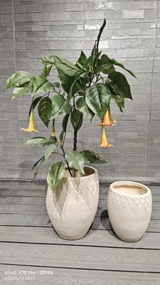 주문 복잡 한 꽃 장식 중립 비지 실린더적 인 섬유 점토 가벼운 플랜터 online manufacture